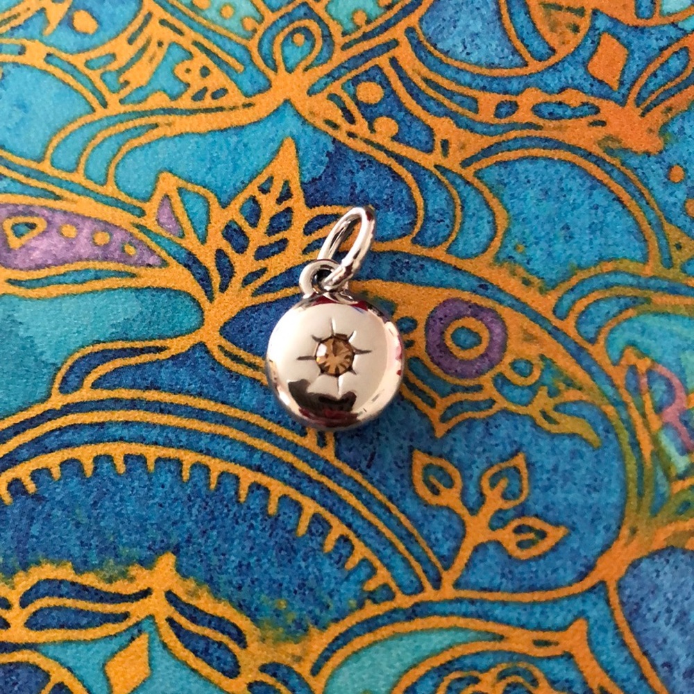 Tresors charm topaz November